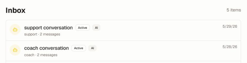 Use the AI badge and conversation metadata to choose the correct history without exposing personal message content. The unified Inbox with two generic AI conversations, status badges, message counts, and latest-activity dates.